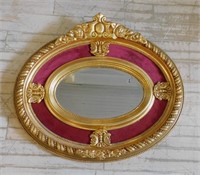Cartouche Crowned Gilt Oval Beveled Mirror.