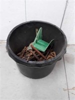 Tub with auger drill bits pry bars rope and more