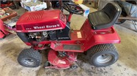 Wheel horse riding lawn mower two 12–6 model