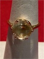 14 karat gold ring. Size 7. Unknown faceted stone