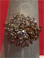 14 karat gold ring. Size 7. The stones are CZ.