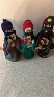 CHARMING CHRISTMAS CAROLERS ON WOODEN PEDESTALS