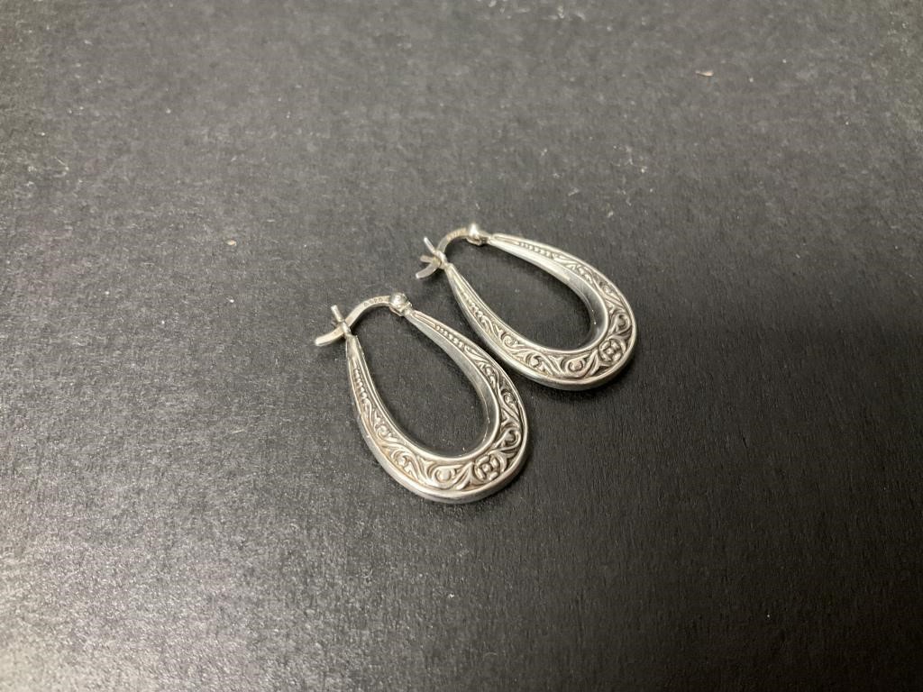 Oval Sterling Silver Hoop Earrings.