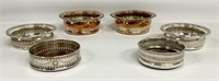 6 silver plated wine coaster, some marked