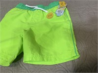 kids medium cat and jack swim trunks green