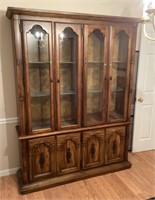 One-piece lighted cabinet