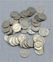 Small jar of 1960s nickels