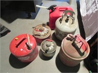 (5) gas cans. Lot also includes 1 LP tank with