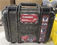 Husky Multi-use weatherproof case with contents