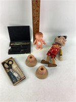 Kewpie Doll, Pinocchio Puppet Doll Missing Arm