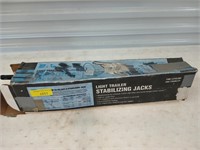 Light trailer stabilizing jacks