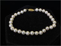 14k GOLD clasp & Pearl bracelet, (clasp needs