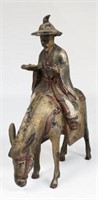 Painted Cast Iron Figure of Asian Man on a Donkey.