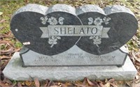 Engraved granite double heart headstone on base: