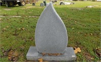 Granite flame shaped headstone on base: