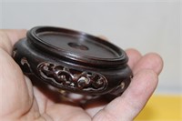 A Small Carved Woodstand