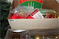 Two boxes of Christmas Decorations.