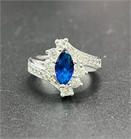 5.5 beautiful silver toned blue clear stone ring