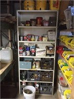 Metal shelf with content, mostly cans of nails