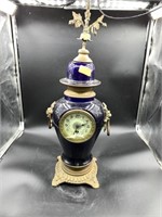 Antique mantel clock made in France with cobalt po