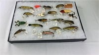 Vintage fishing lures in showcase