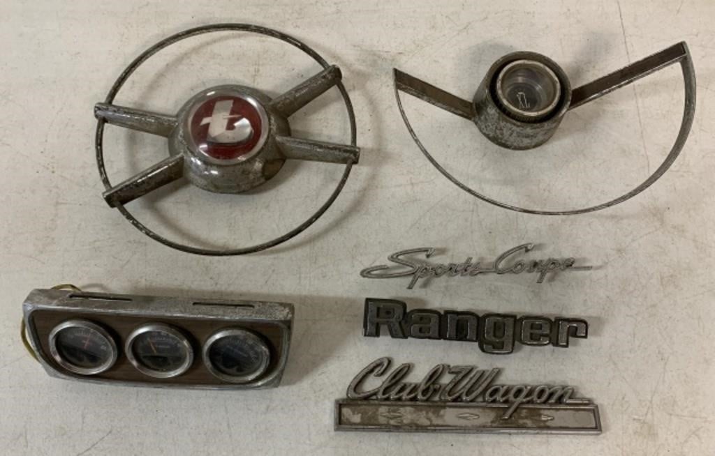 lot of vehicle name plates, horn rings, gauges