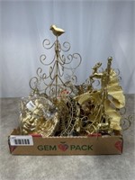 Gold painted decorations, various sizes. Tallest