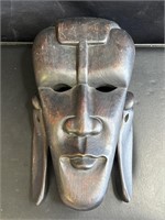 Vintage African carved wood mask with