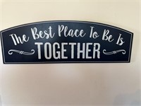 The best place to be is together sign