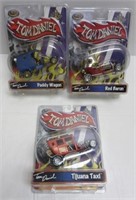 (3) Tom Daniel toy cars in original packaging.