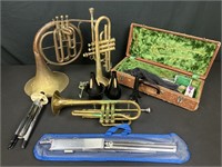 Two trumpets French horn accessories box
