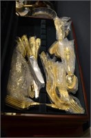 Three cased silver plated gilt flatware services