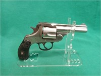 H&R auto ejecting 38S&W 5 shot revolver.