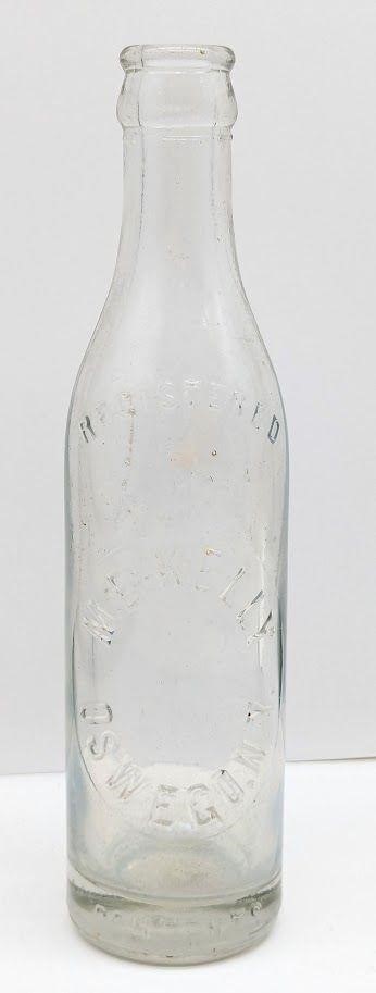 Registered M.E. Kelly Soda Bottle