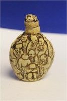 A Carved Resin Snuff Bottle