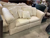 Baker sofa, one pillow stained. 28 in high x 75 x