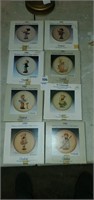8 Goebel miniature collector plates.