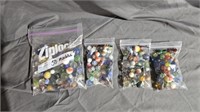 Glass Marbles,  4 bags containing 50 each