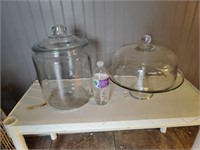 Glass storage jar and cake platter with lid.