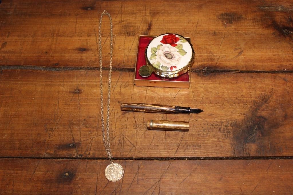 Fountain pen, necklace and compact