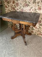 Granite top, ornate table