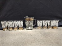 Glass juice jug with 8 matching glasses