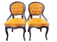 Pair Of Orange Cushioned Chairs