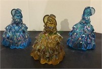 Lot of three iridescent/opalescent glass lady