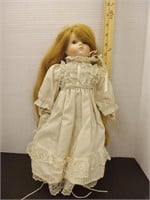 1986 Porcelain doll 16in tall