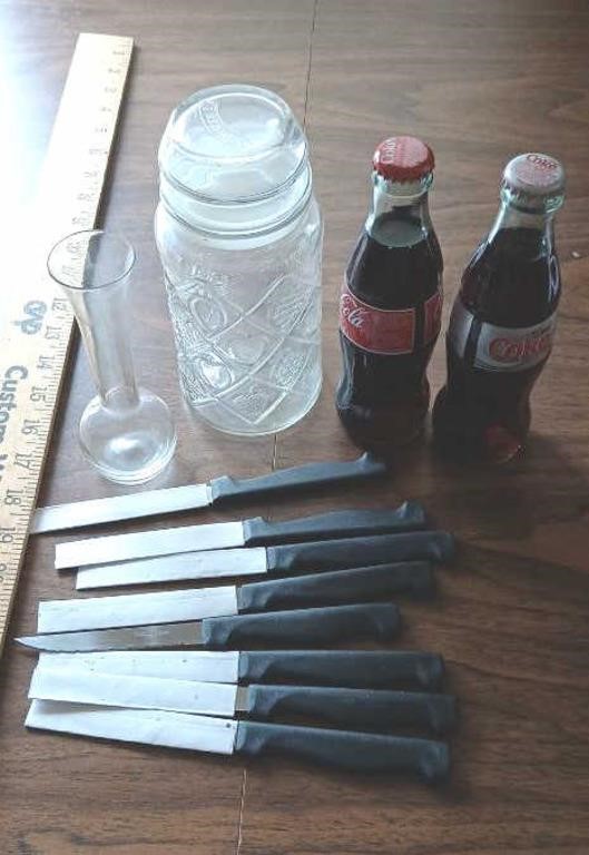 Steak knifes vase coke bottles  and jar