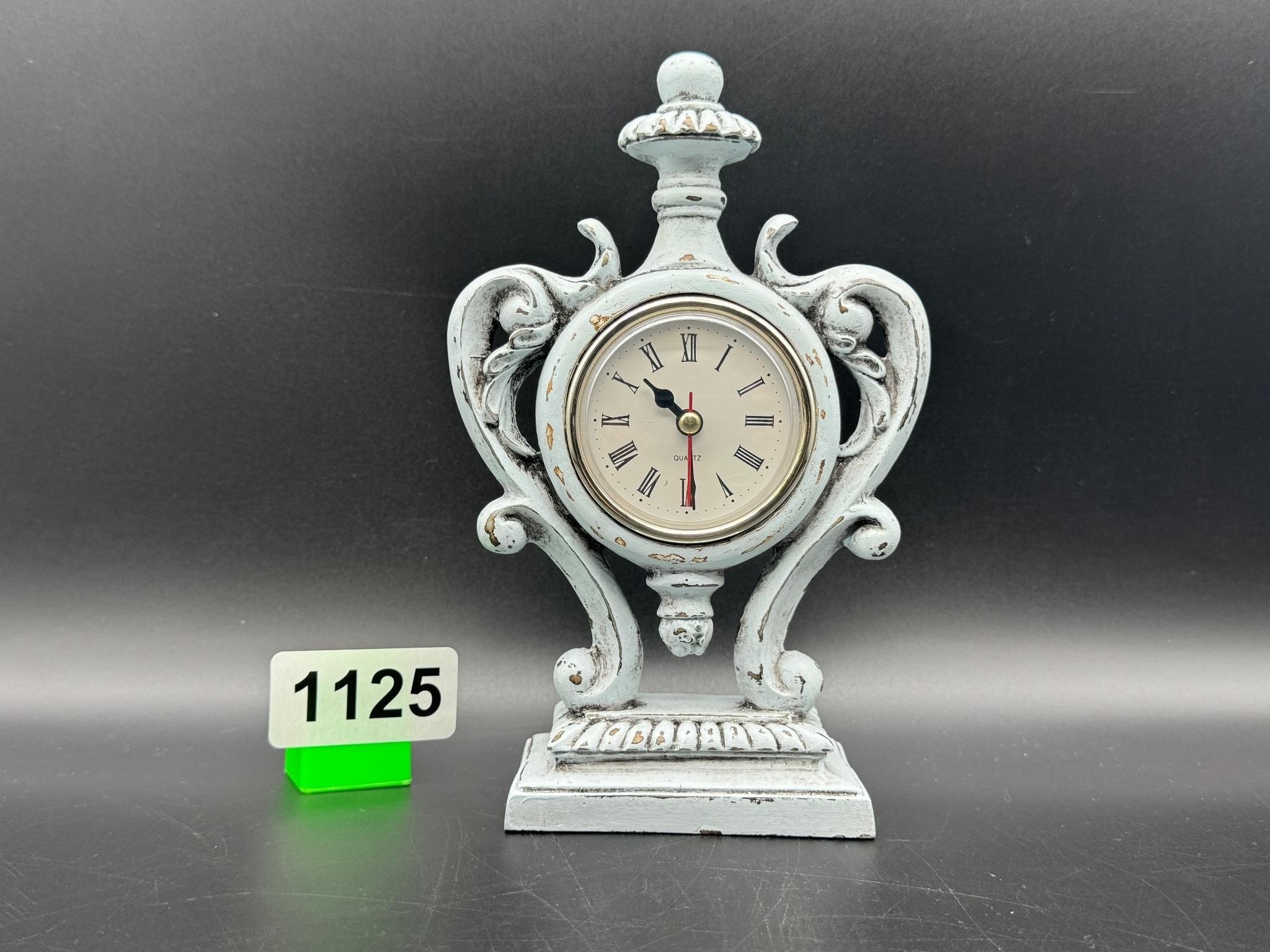 7" tall ornate metal clock with distressed paint