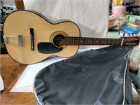 Kids size guitar with case, no brand