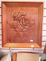 Carved relief of roses in wooden frame, 17" x 15"