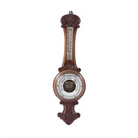 German Black Forest carved walnut barometer